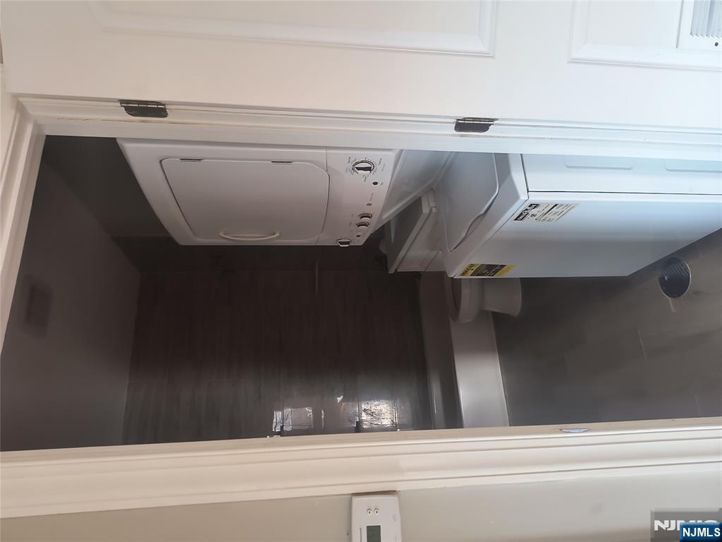 384 Fairview Avenue, Unit 3 Fairview, NJ 07022 - Photo 10 of 11 a bathroom with a sink and mirror