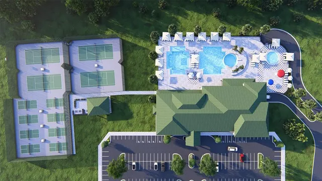 a view of a patio with couches and table and chairs