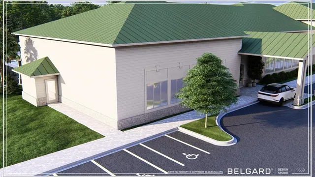 a view of a backyard with a patio and outdoor seating