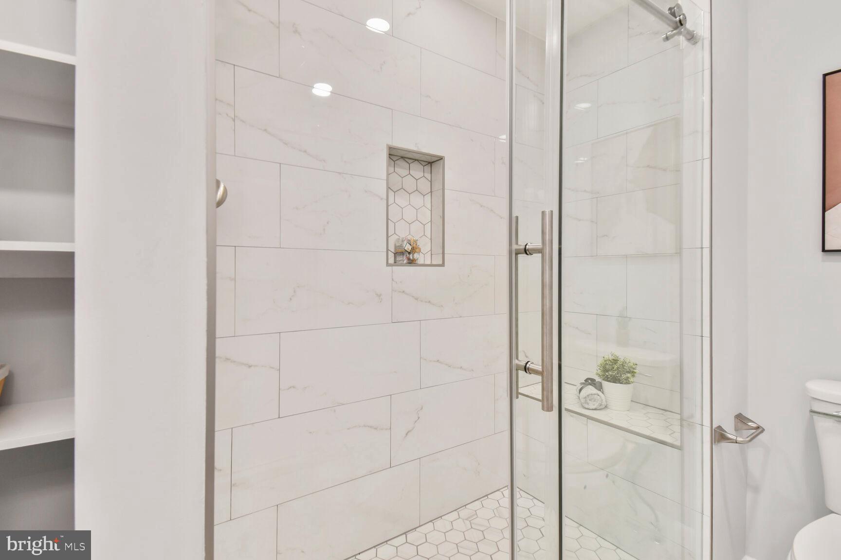 2895 Schoolhouse Circle Silver Spring, MD 20902 - Photo 17 of 33 a bathroom with a shower