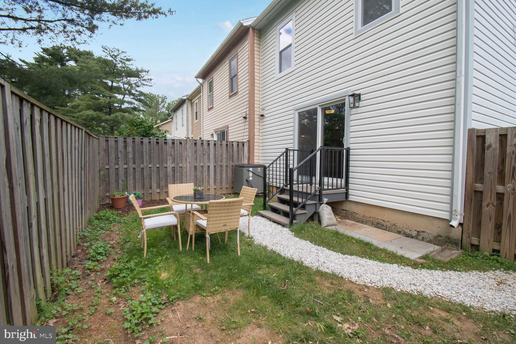 2895 Schoolhouse Circle Silver Spring, MD 20902 - Photo 30 of 33 a view of backyard with sitting area