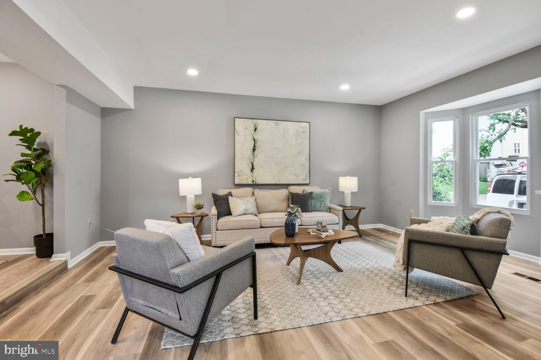 2895 Schoolhouse Circle Silver Spring, MD 20902 - Photo 4 of 33 a living room with furniture and a window