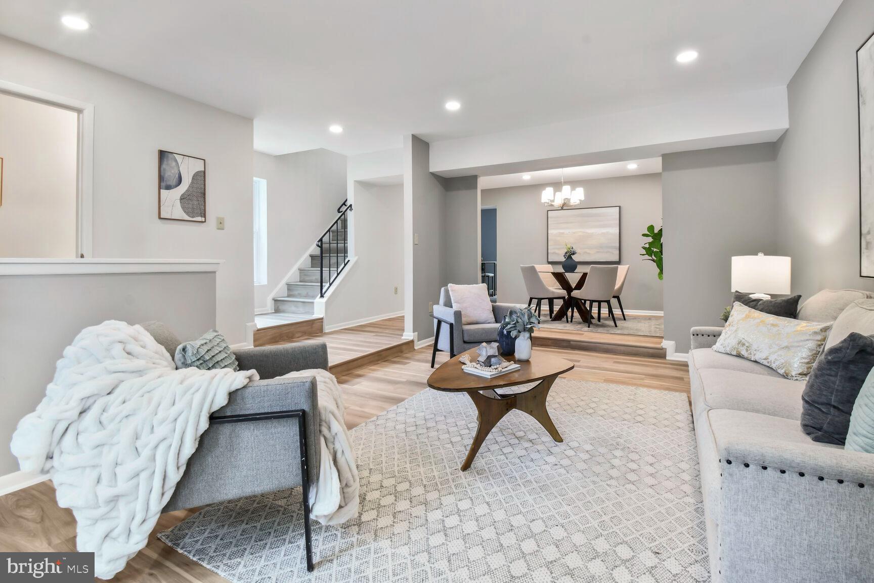 2895 Schoolhouse Circle Silver Spring, MD 20902 - Photo 5 of 33 a living room with furniture and a wooden floor
