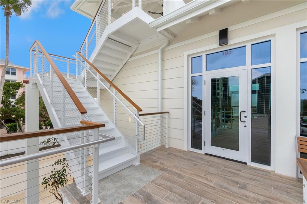 5100 Baybridge Boulevard, Unit 1201 Estero, FL 33928 - Photo 36 of 37 a view of entryway and hall with wooden floor