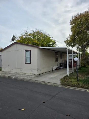 a view of a house with a patio