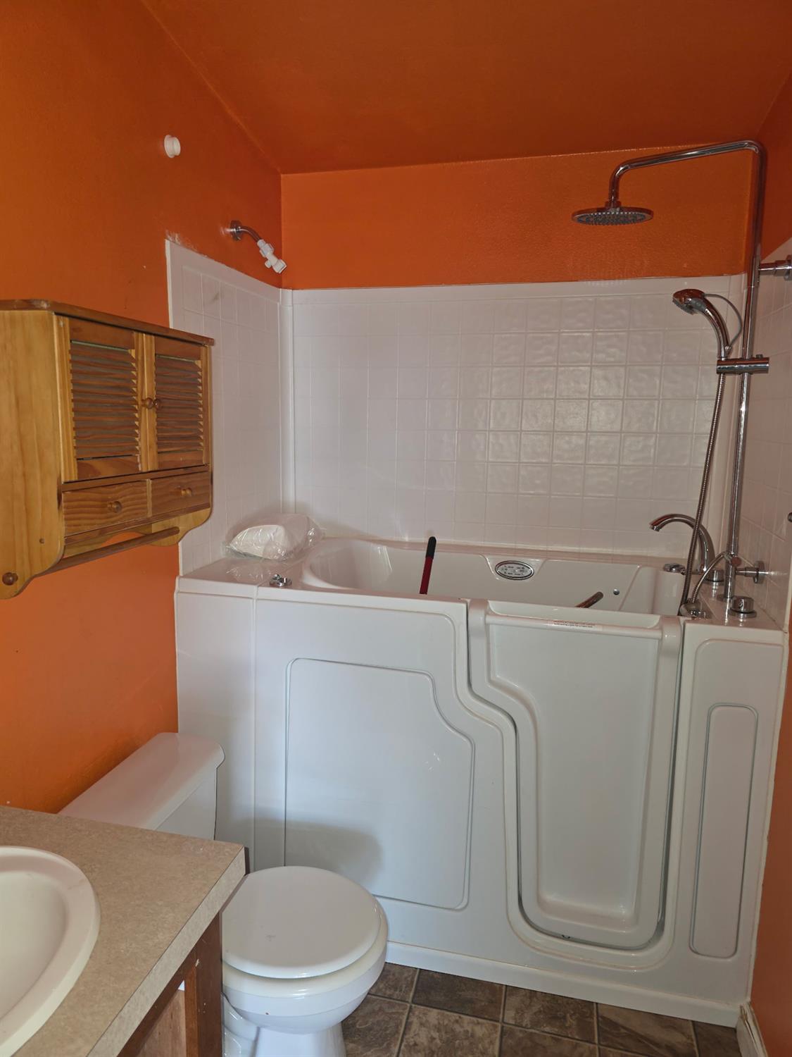 3901 Lake Road, Unit 29 West Sacramento, CA 95691 - Photo 11 of 15 a bathroom with a sink a toilet and shower