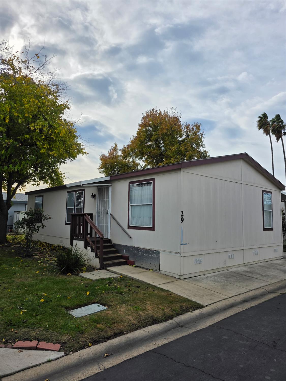 3901 Lake Road, Unit 29 West Sacramento, CA 95691 - Photo 2 of 15 front view of house with a yard