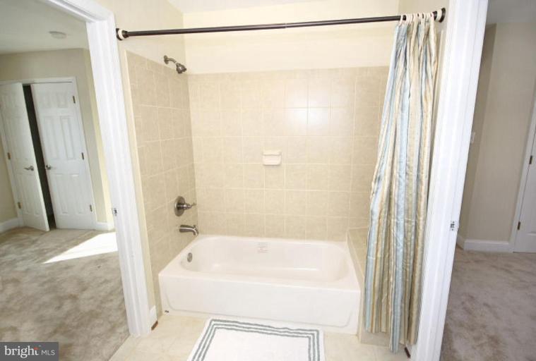 11510 Grandview Avenue Silver Spring, MD 20902 - Photo 22 of 29 Bath 2 View to Tub w/ Entrance to Bedrooms 2 & 3