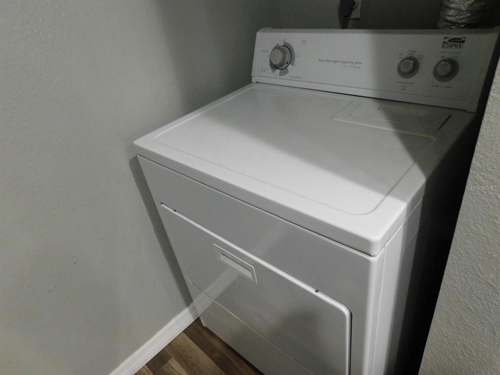1077 South Hiawassee Road, Unit 823 Orlando, FL 32835 - Photo 26 of 29 a close up view of washer and dryer