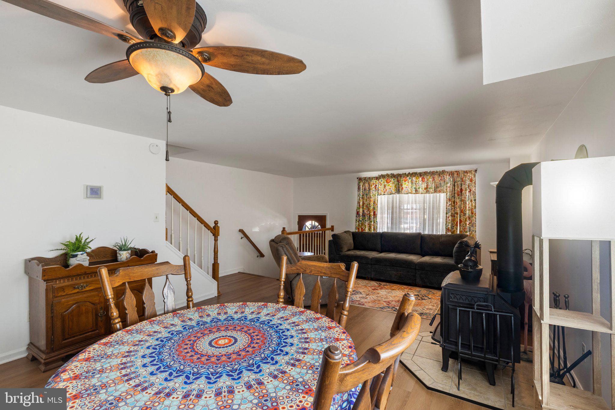 5620 Chelwynd Road Halethorpe, MD 21227 - Photo 3 of 22 a living room with furniture and a rug