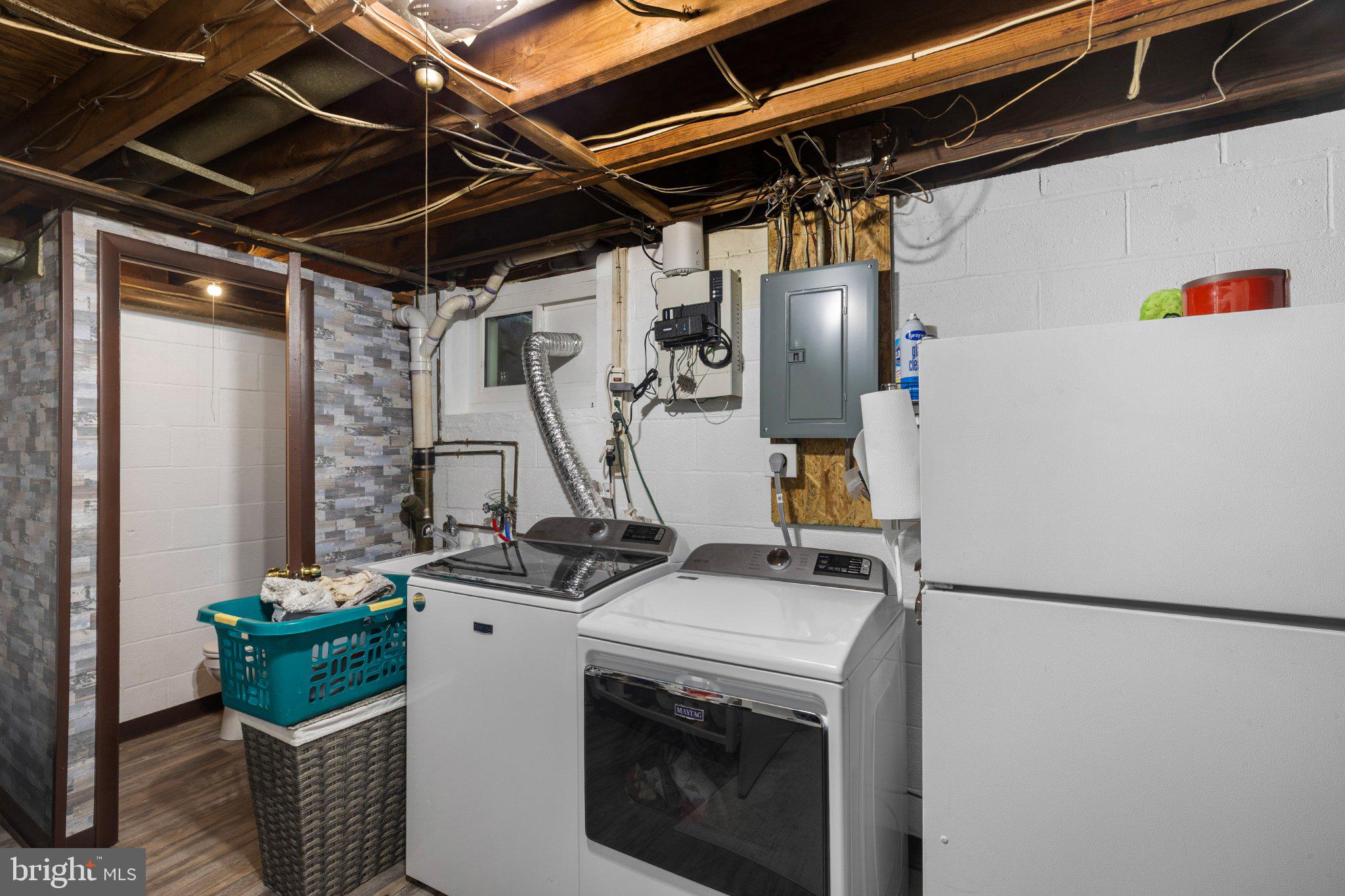 5620 Chelwynd Road Halethorpe, MD 21227 - Photo 10 of 22 a utility room with dryer and washer