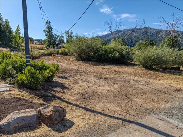 a view of a street with an trees