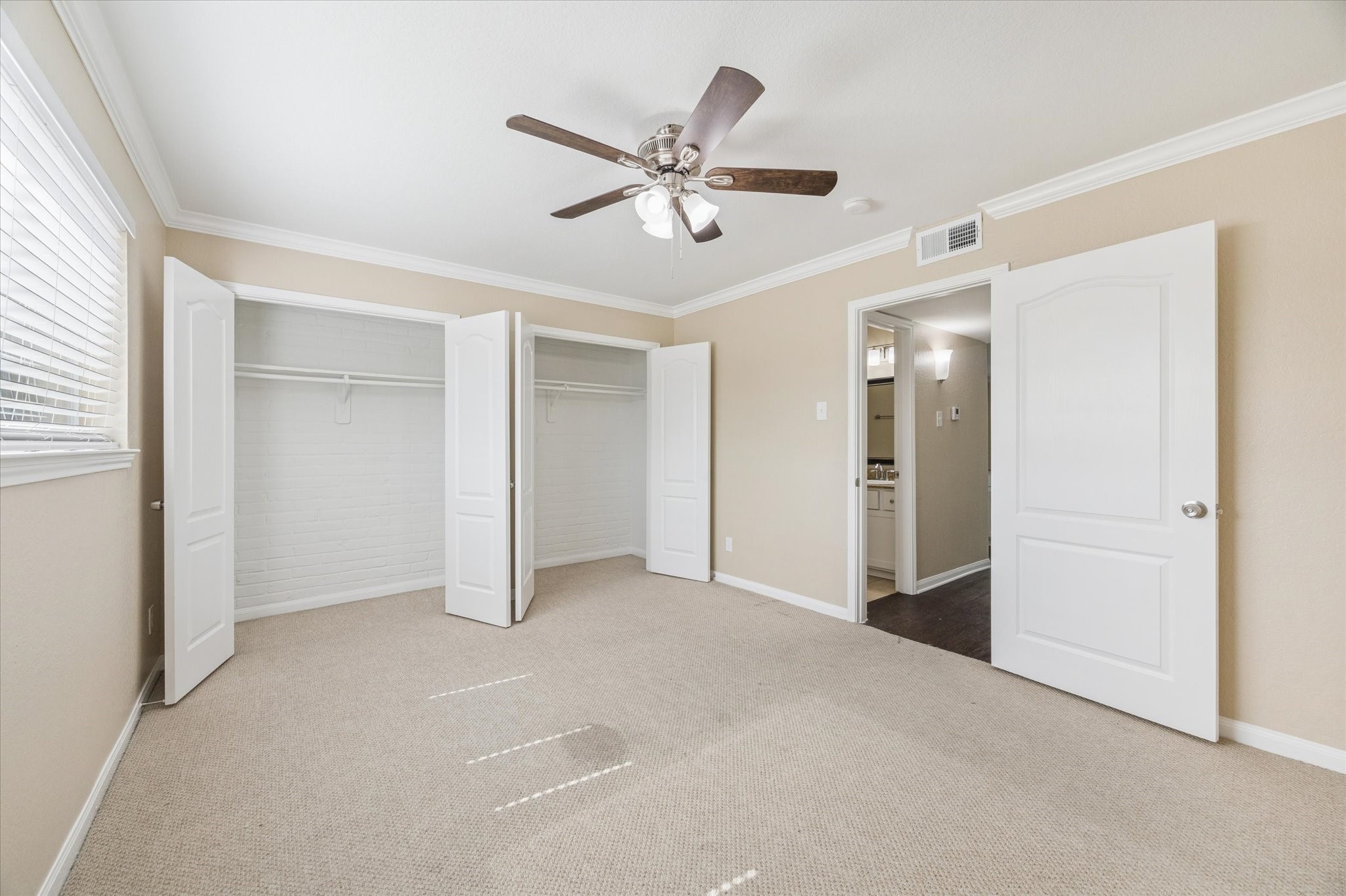 300 Pecore Street, Unit 19 Houston, TX 77009 - Photo 8 of 10 a view of an empty room with a ceiling fan
