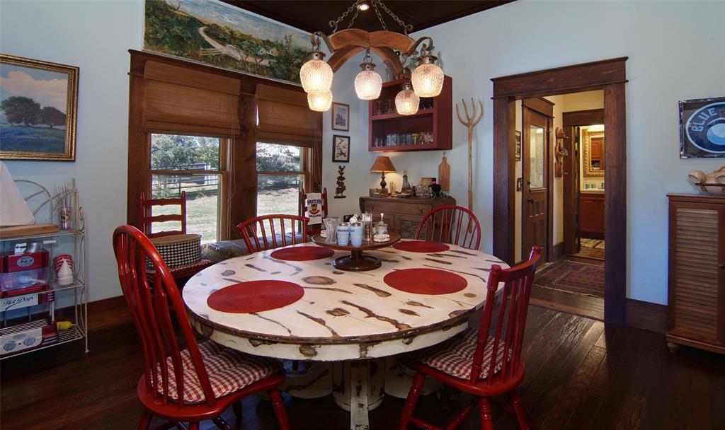400 Weldons Way Graford, TX 76449 - Photo 16 of 35 a view of a dining room with furniture window and wooden floor