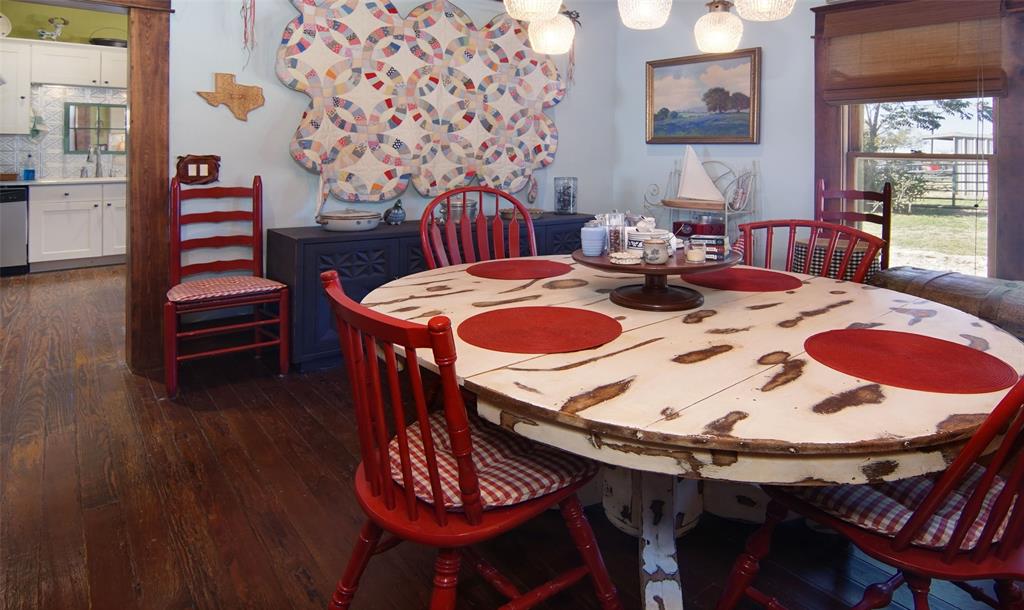 400 Weldons Way Graford, TX 76449 - Photo 18 of 35 a view of a dining room with furniture and wooden floor