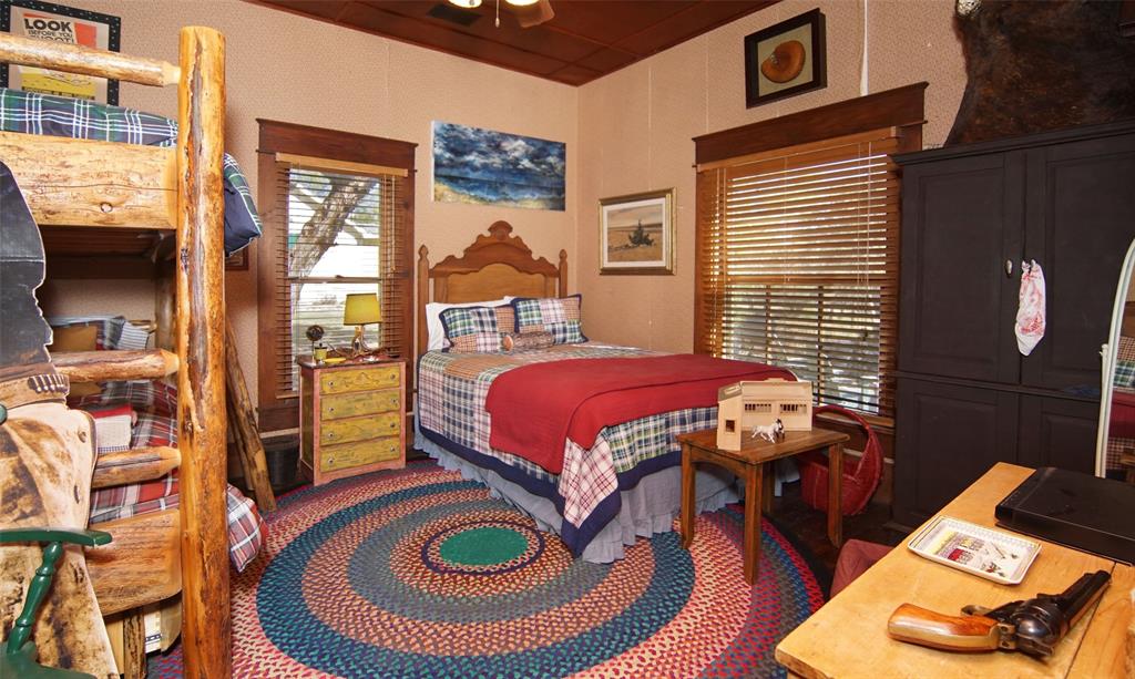 400 Weldons Way Graford, TX 76449 - Photo 23 of 35 a bedroom with furniture and a rug