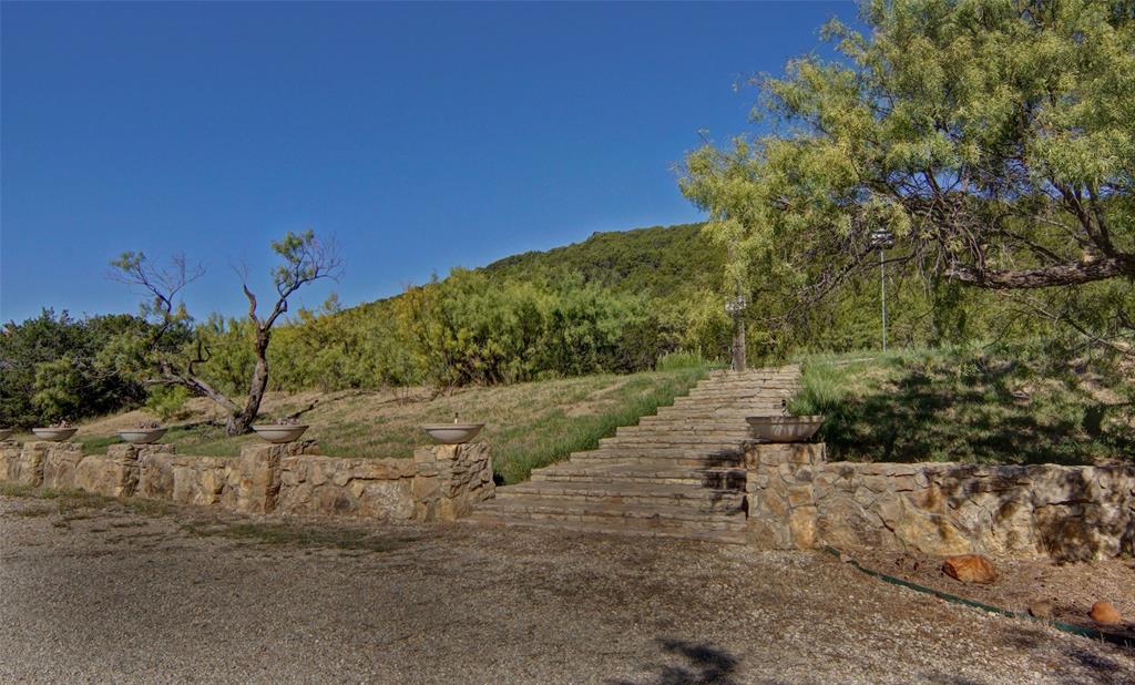 400 Weldons Way Graford, TX 76449 - Photo 30 of 35 a view of a road with a building in background