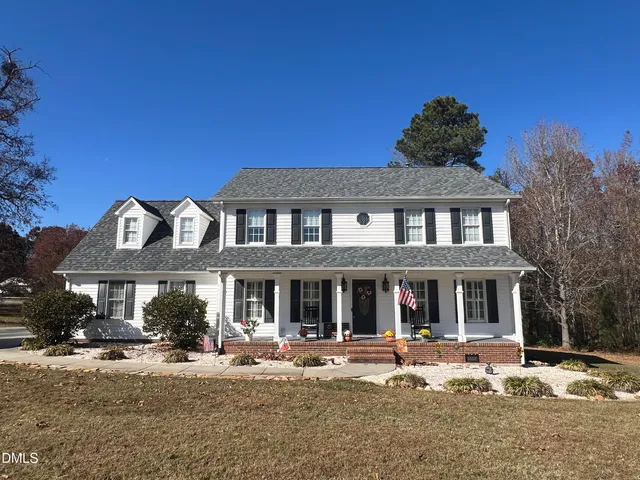a front view of a house with a patio