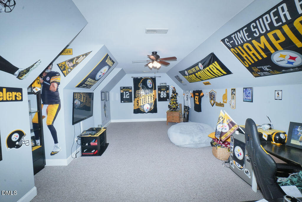 8877 Racine Road Pleasant Garden, NC 27313 - Photo 23 of 45 a view of a room with gym equipment