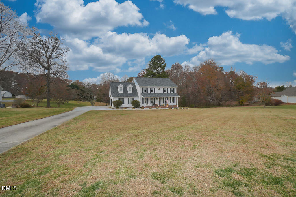 8877 Racine Road Pleasant Garden, NC 27313 - Photo 25 of 45 a view of street sign under an umbrella