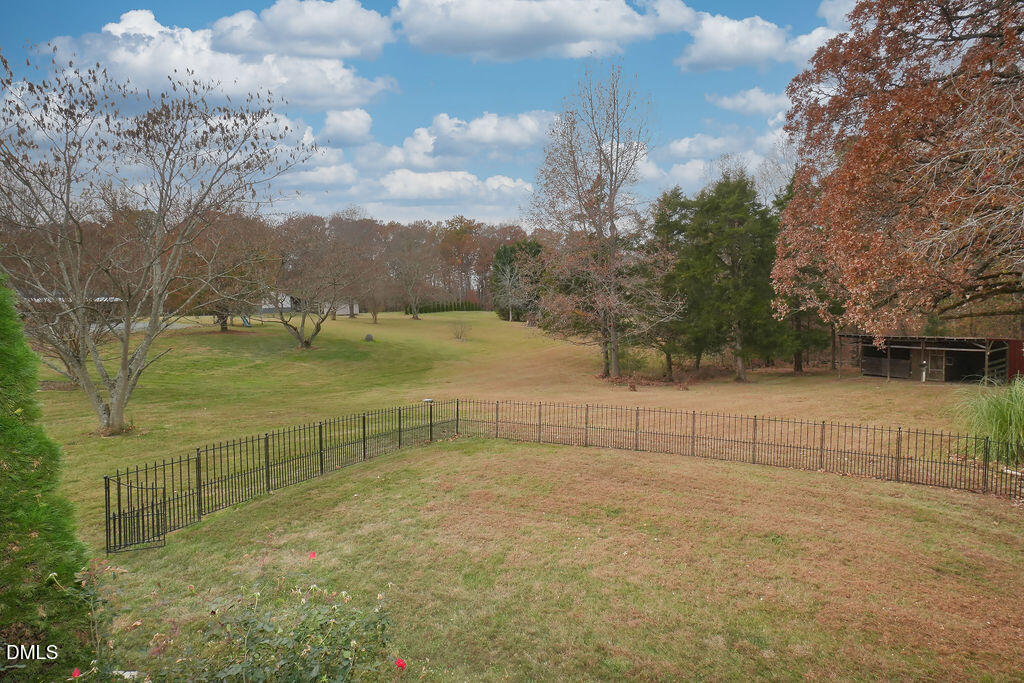 8877 Racine Road Pleasant Garden, NC 27313 - Photo 36 of 45 a view of backyard with green space