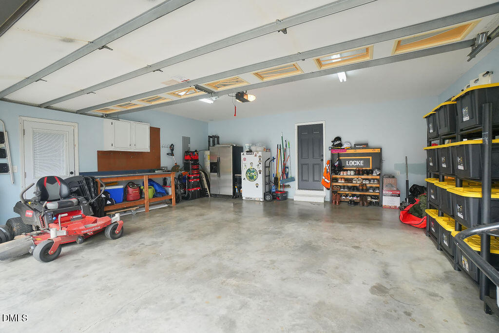 8877 Racine Road Pleasant Garden, NC 27313 - Photo 37 of 45 a view of a room with gym equipment