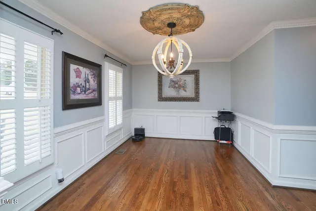 a living room with furniture fireplace and flat screen tv