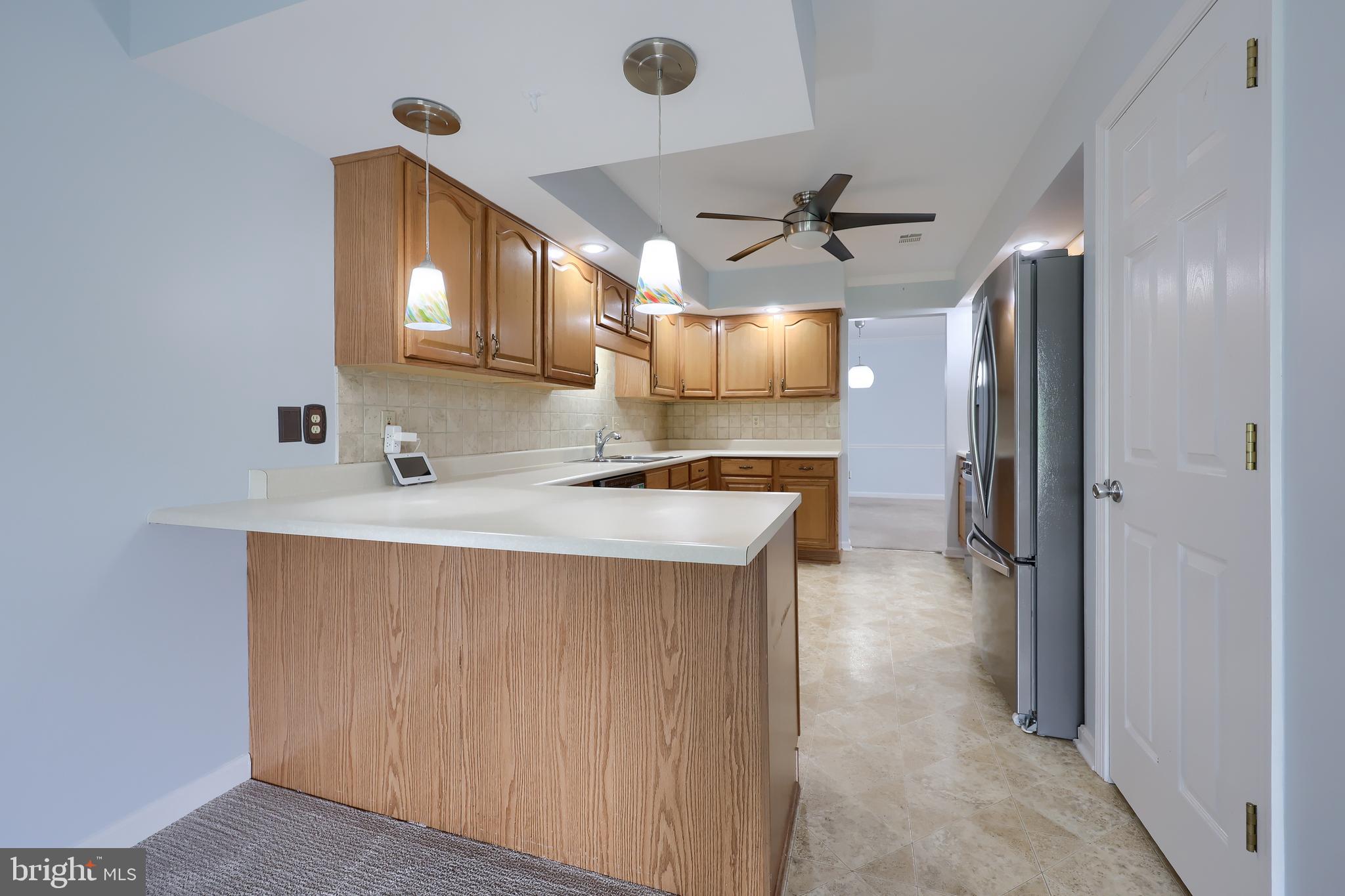 2002 Faversham Way York, PA 17402 - Photo 20 of 37 a kitchen with stainless steel appliances a sink and a refrigerator