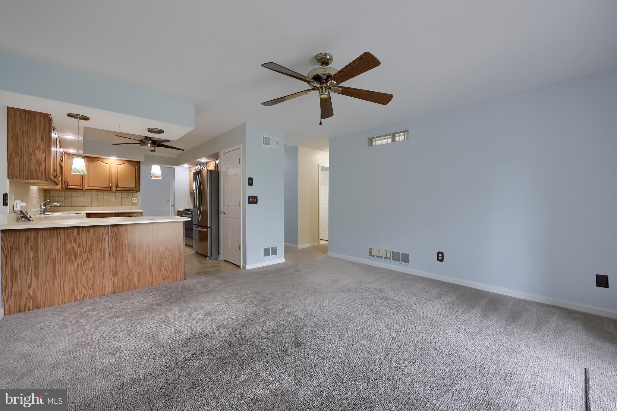 2002 Faversham Way York, PA 17402 - Photo 22 of 37 a view of a kitchen with a sink and a refrigerator