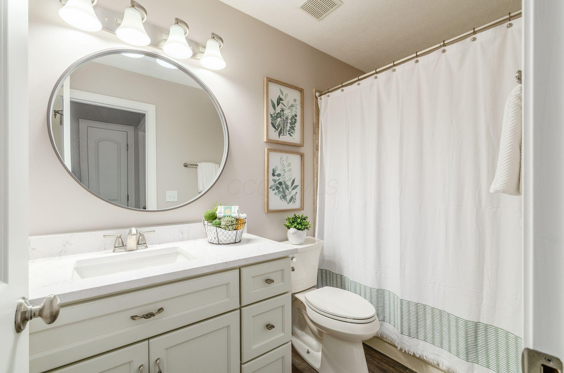 9471 Concord Road Powell, OH 43065 - Photo 28 of 40 UPDATED FULL HALL BATHROOM