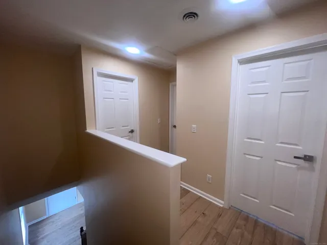 wooden floor and window in a room