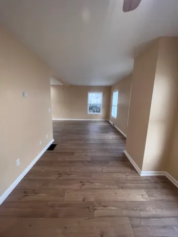 a view of an empty room and window