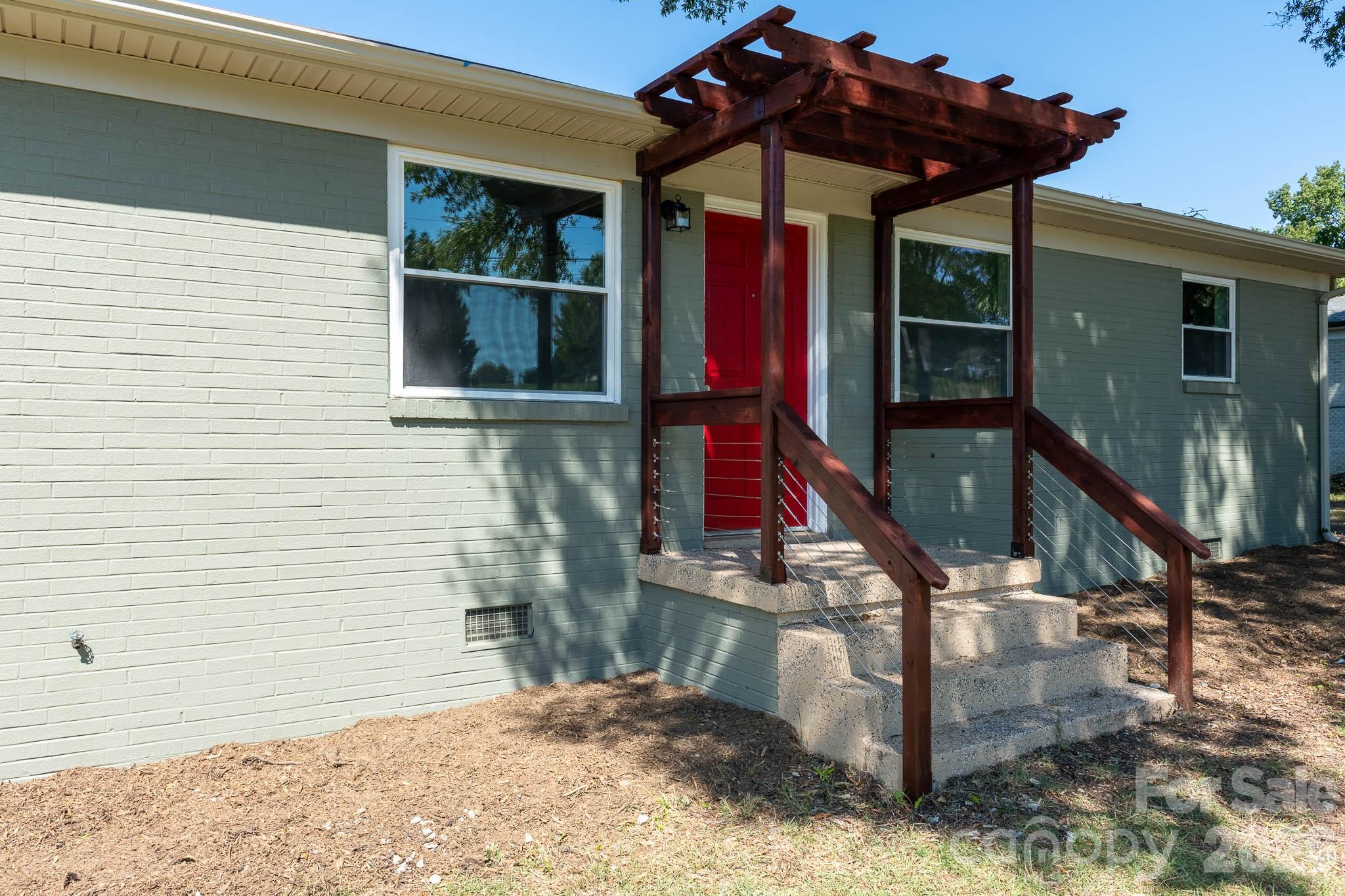 108 South Little Texas Road Kannapolis, NC 28083 - Photo 2 of 18 a front view of a house with a yard