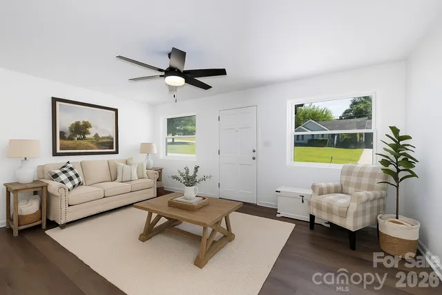 a living room with furniture and a window