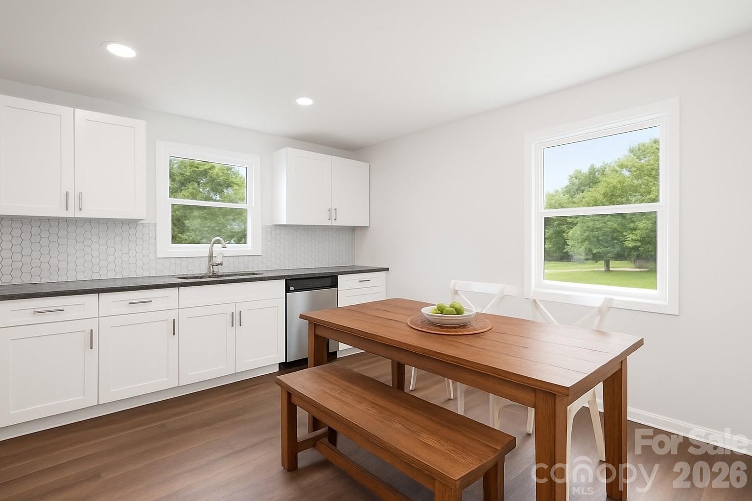 108 South Little Texas Road Kannapolis, NC 28083 - Photo 9 of 18 a kitchen with a table and chairs in it