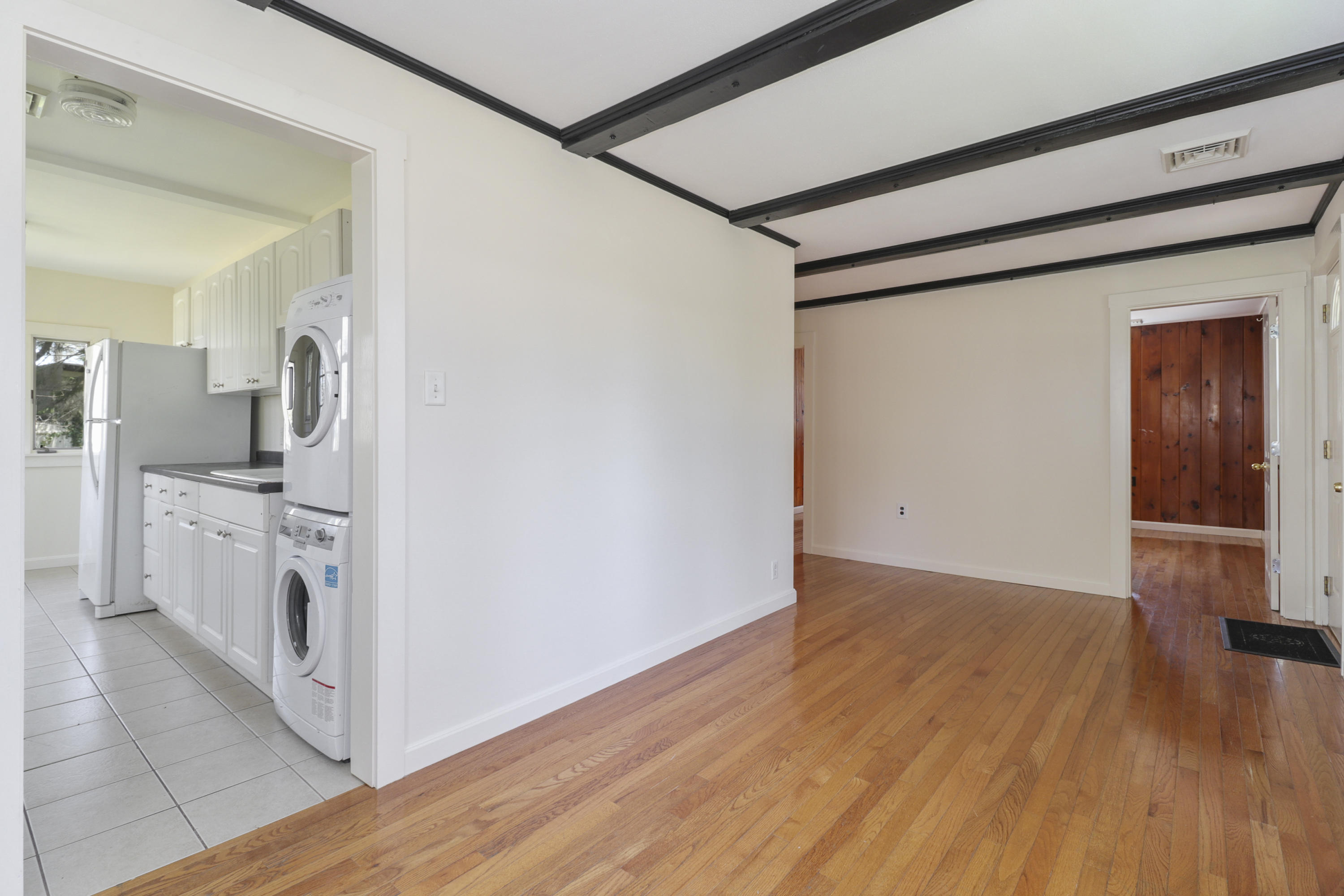 1245 A County Road Cataumet, MA 02534 - Photo 6 of 23 a view of a kitchen with wooden floor and electronic appliances