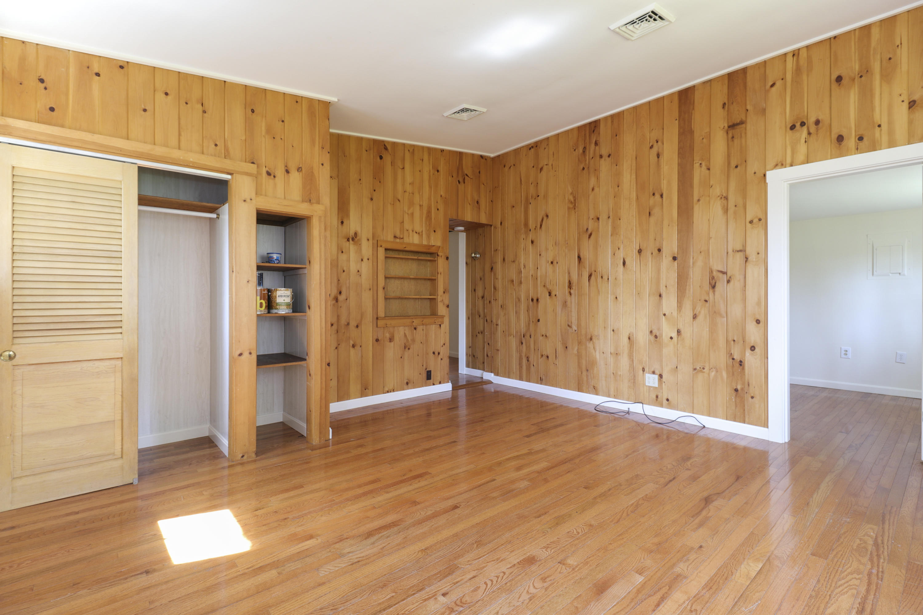 1245 A County Road Cataumet, MA 02534 - Photo 8 of 23 a view of an empty room with wooden floor