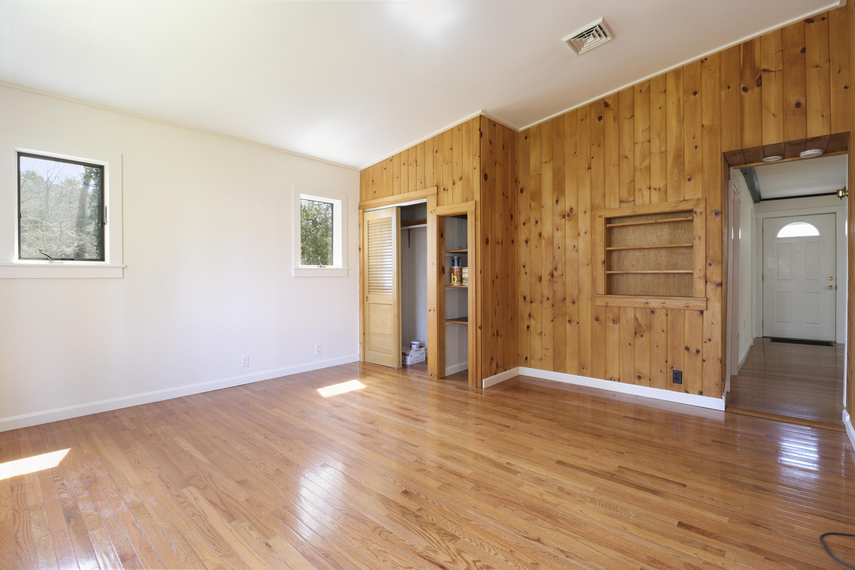 1245 A County Road Cataumet, MA 02534 - Photo 9 of 23 a view of an empty room with wooden floor