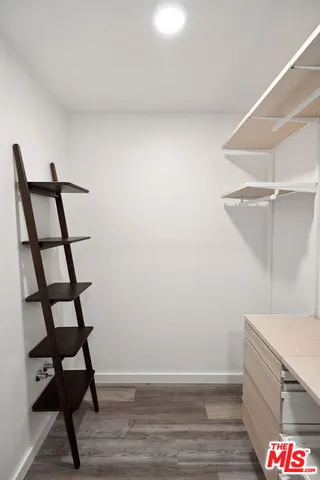 a view of a balcony with chairs