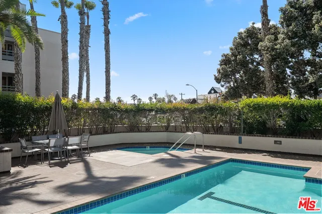 a picture of a bathroom with a shower