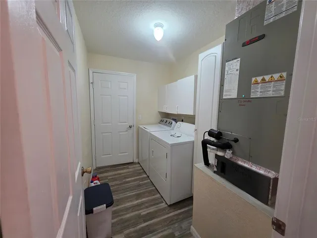 an aerial view of a house with a swimming pool