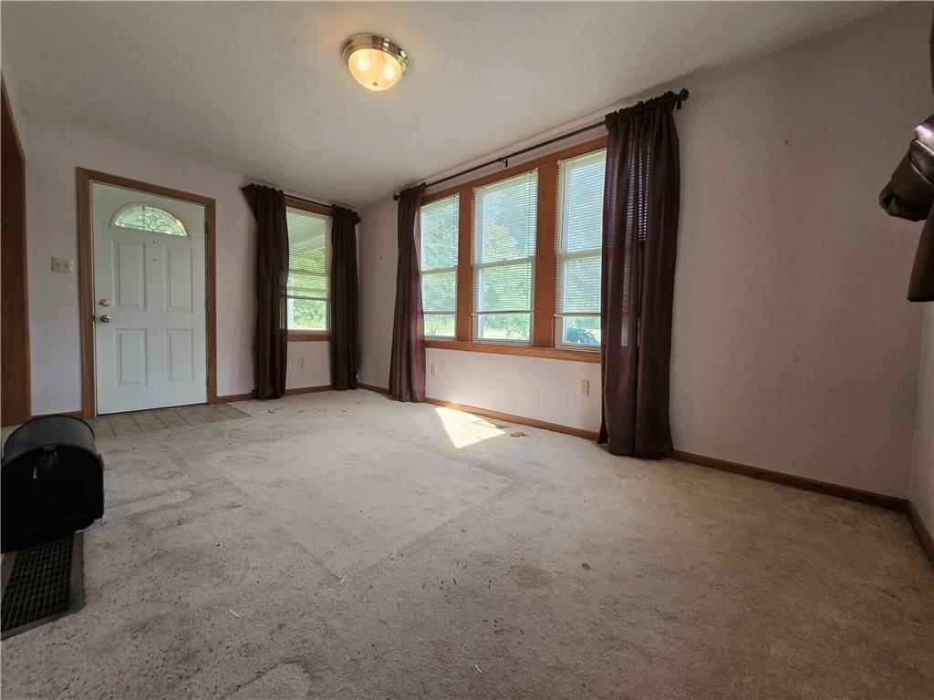 1731 Pulaski Road New Castle, PA 16105 - Photo 11 of 27 Living room from dining area