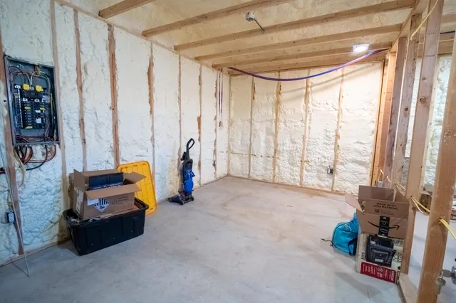 a view of game room with windows