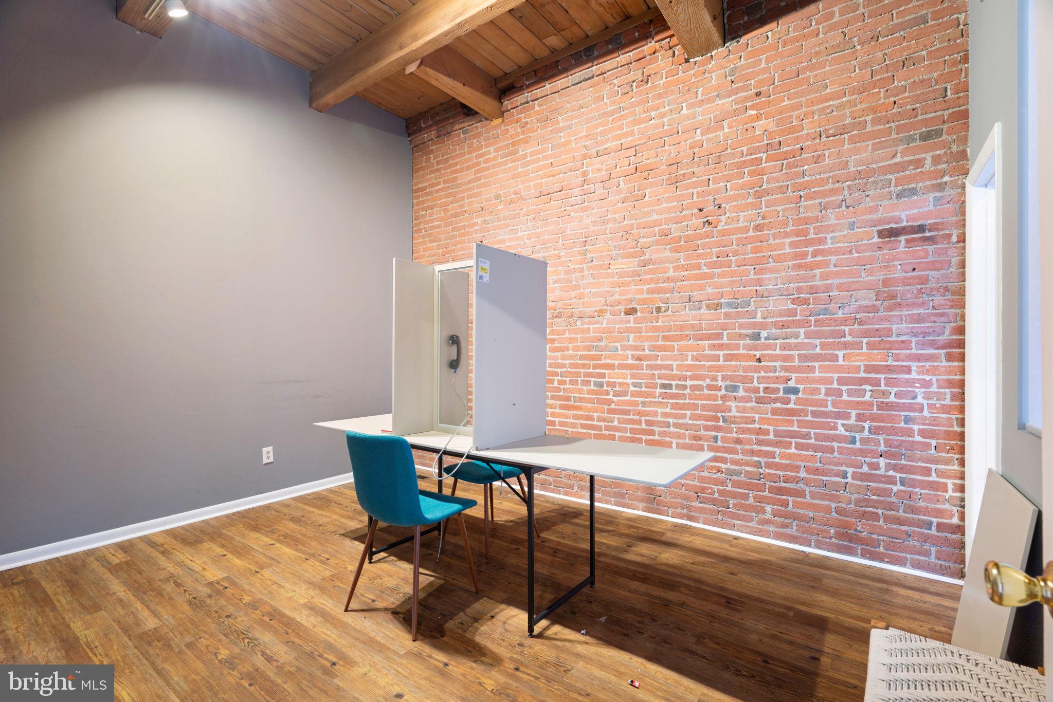 115 Cuthbert Street, Unit B Philadelphia, PA 19106 - Photo 17 of 30 a balcony with table and chairs