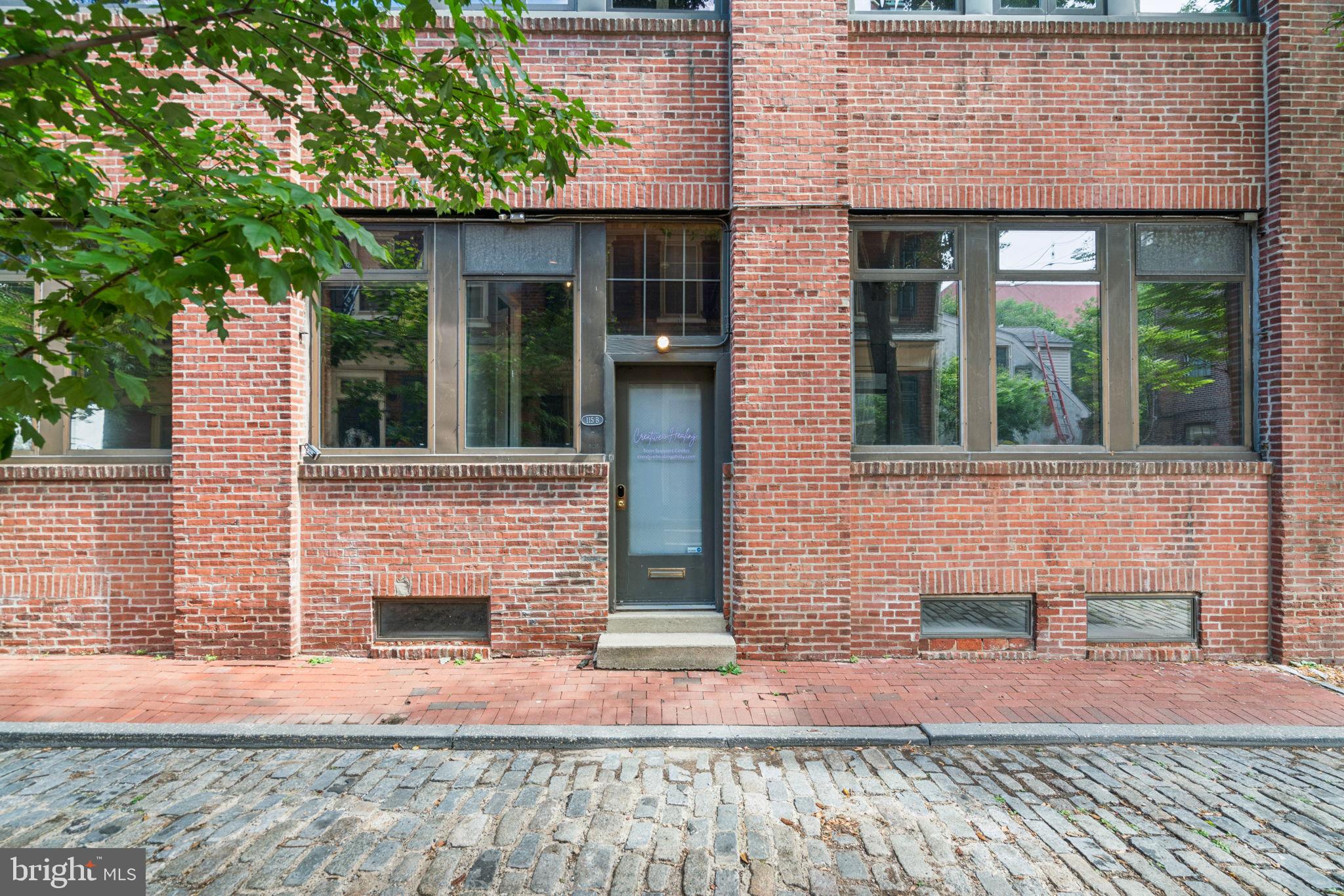 115 Cuthbert Street, Unit B Philadelphia, PA 19106 - Photo 27 of 30 a front view of a house with garden