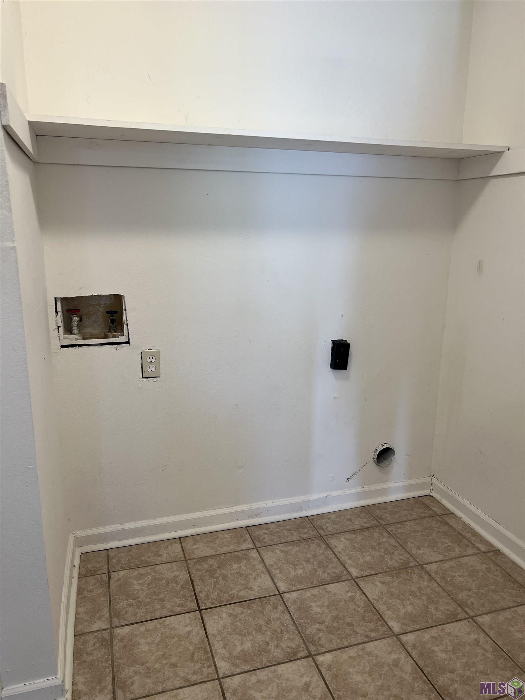 8739 Aubin Road Denham Springs, LA 70726 - Photo 9 of 9 Inside Laundry