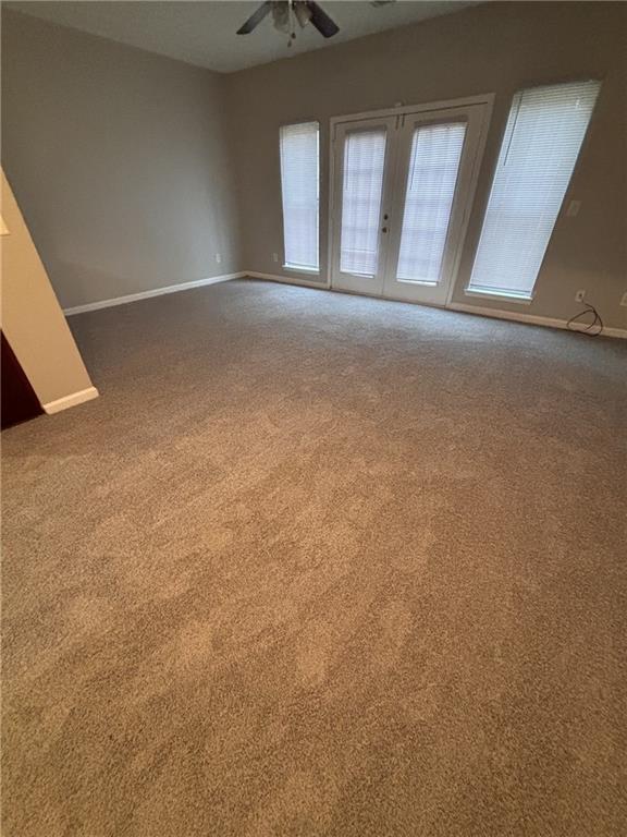 4360 Stone Gate Way, Unit 92 Atlanta, GA 30344 - Photo 8 of 18 a view of empty room with windows