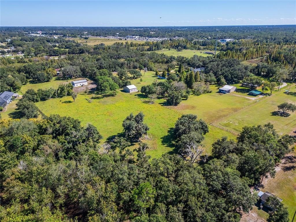6930 Muck Pond Road Seffner, FL 33584 - Photo 10 of 23 a view of a city with mountains in the background
