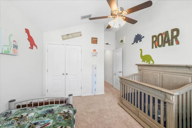 a view of livingroom with furniture and ceiling fan