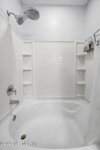 a bathroom with a bathtub